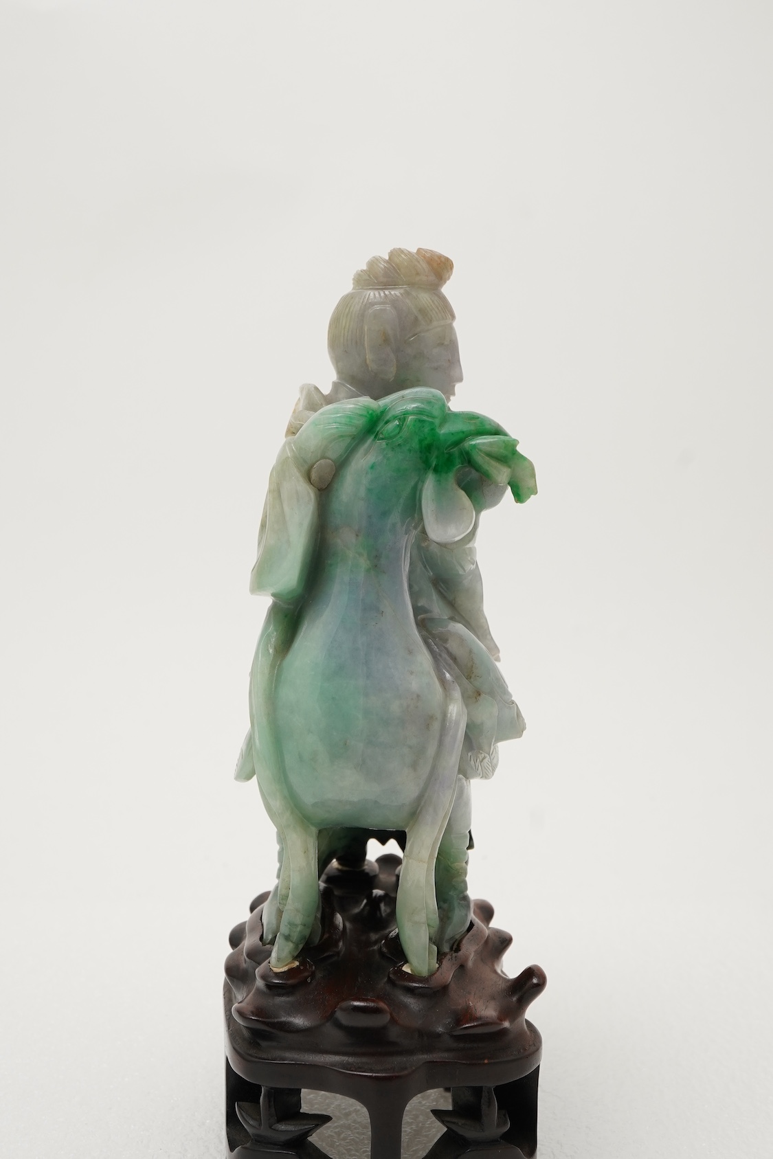 A Chinese jadeite figure of Xi Wangmu riding on a phoenix, late 19th/early 20th century